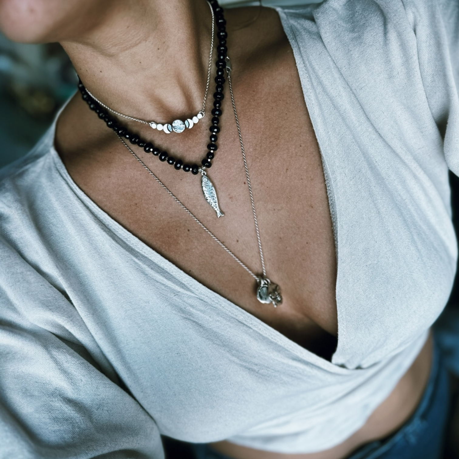 Collar “The Fish Charm & Onix”