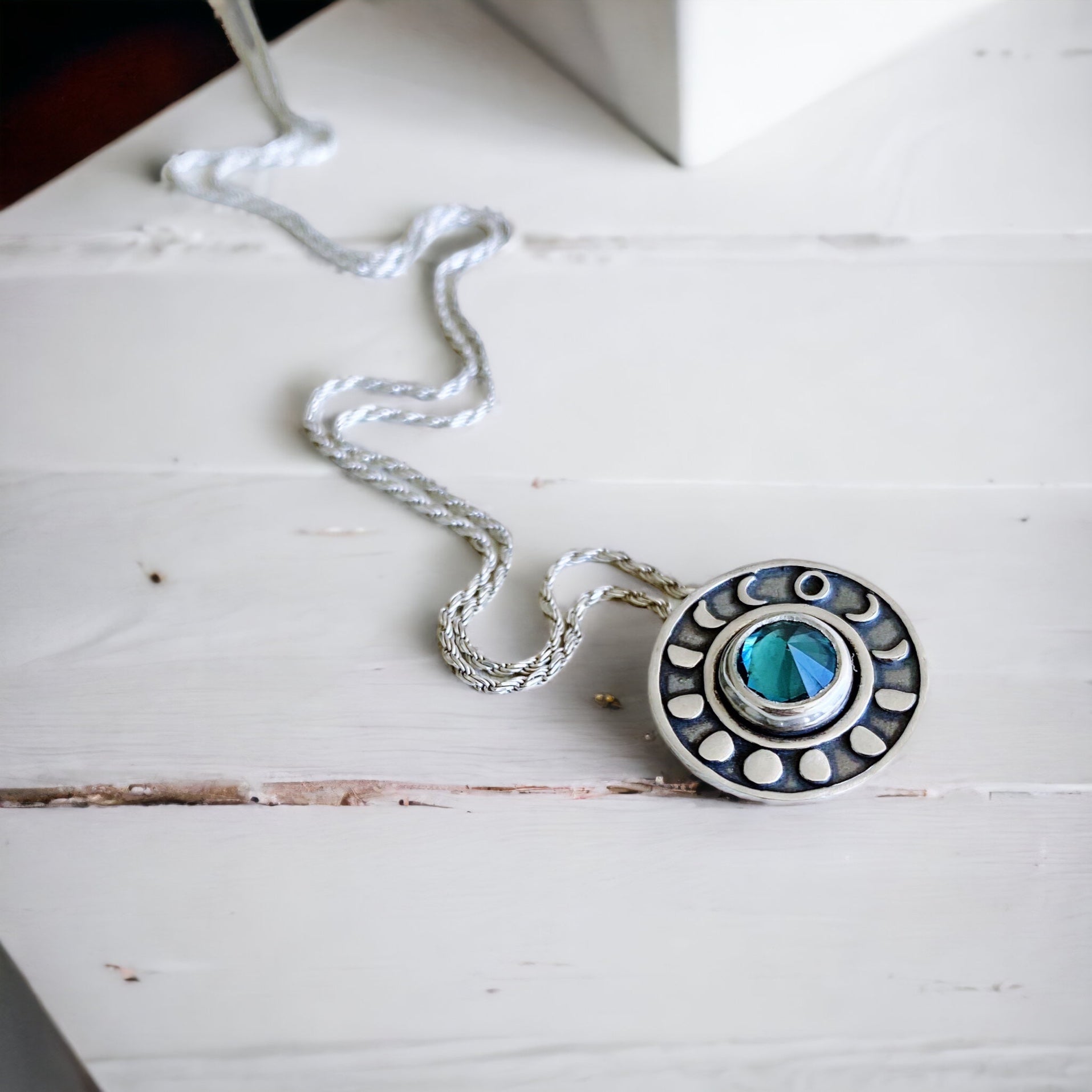 Colgante Medalla Ciclo Lunar Topacio London Blue