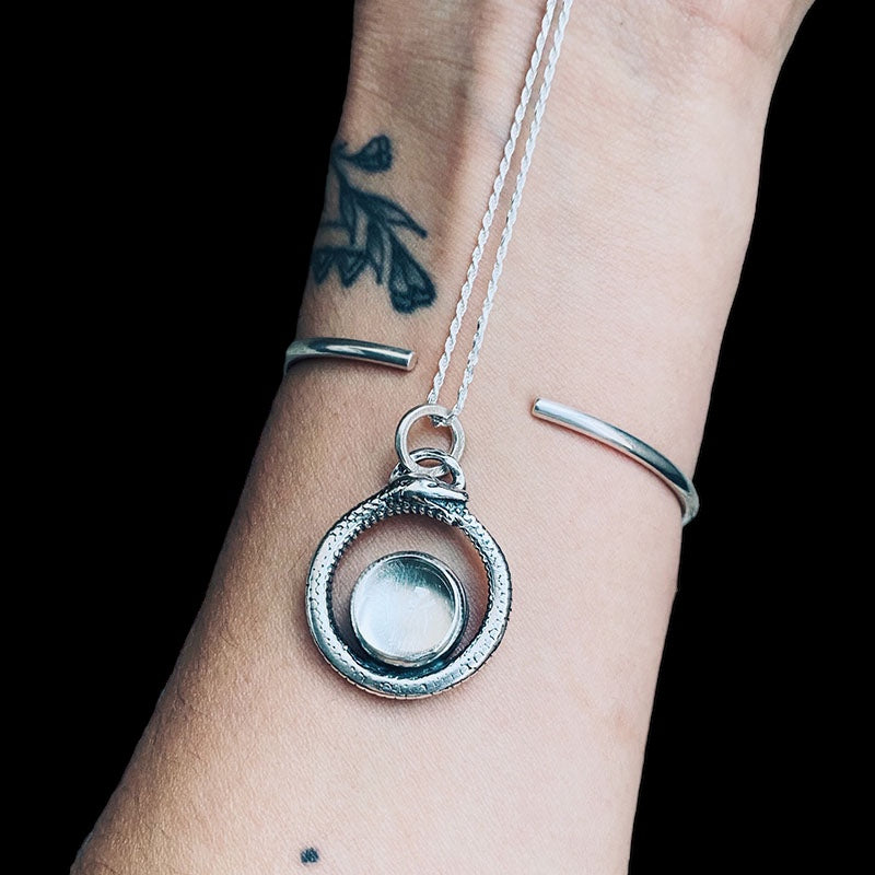 Colgante Ouroboros Cuarzo Transparente - PREVENTA